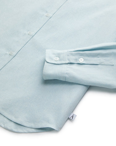 Light blue linen button-up shirt